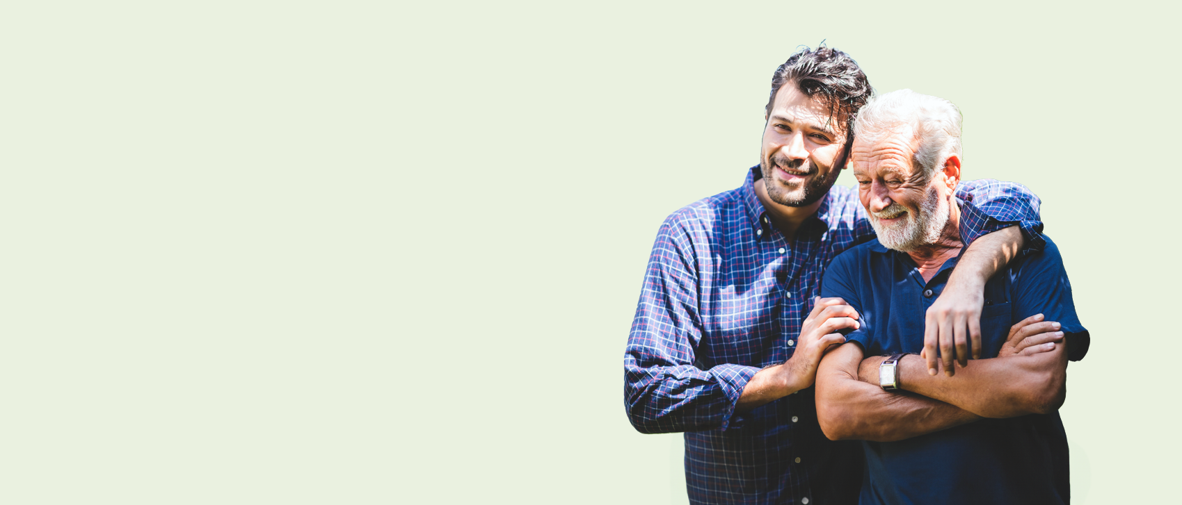 Grown up son with his arm around his father.