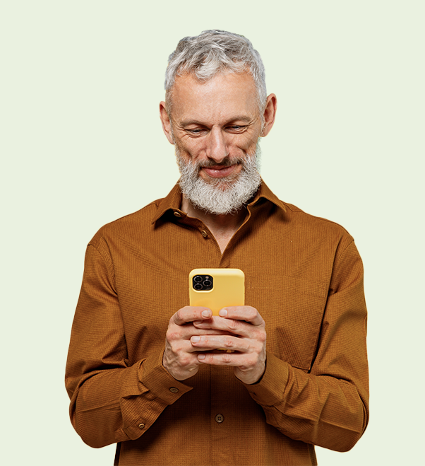 A man in a brown shirt contacting Fond Farewell on his mobile phone.