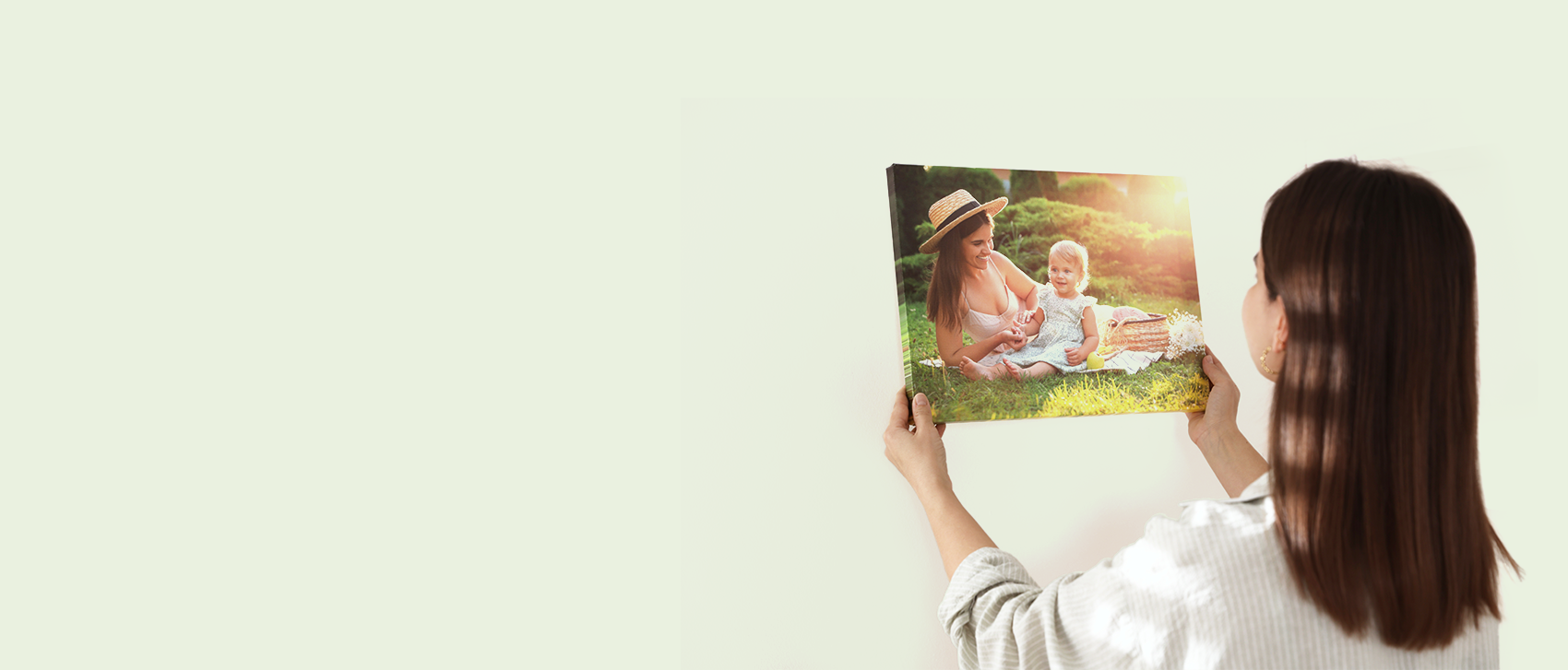 A women looking at a photograph.