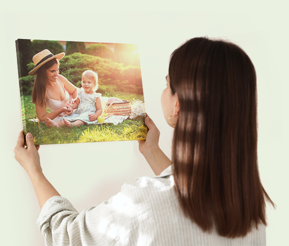 A women looking at a photograph.